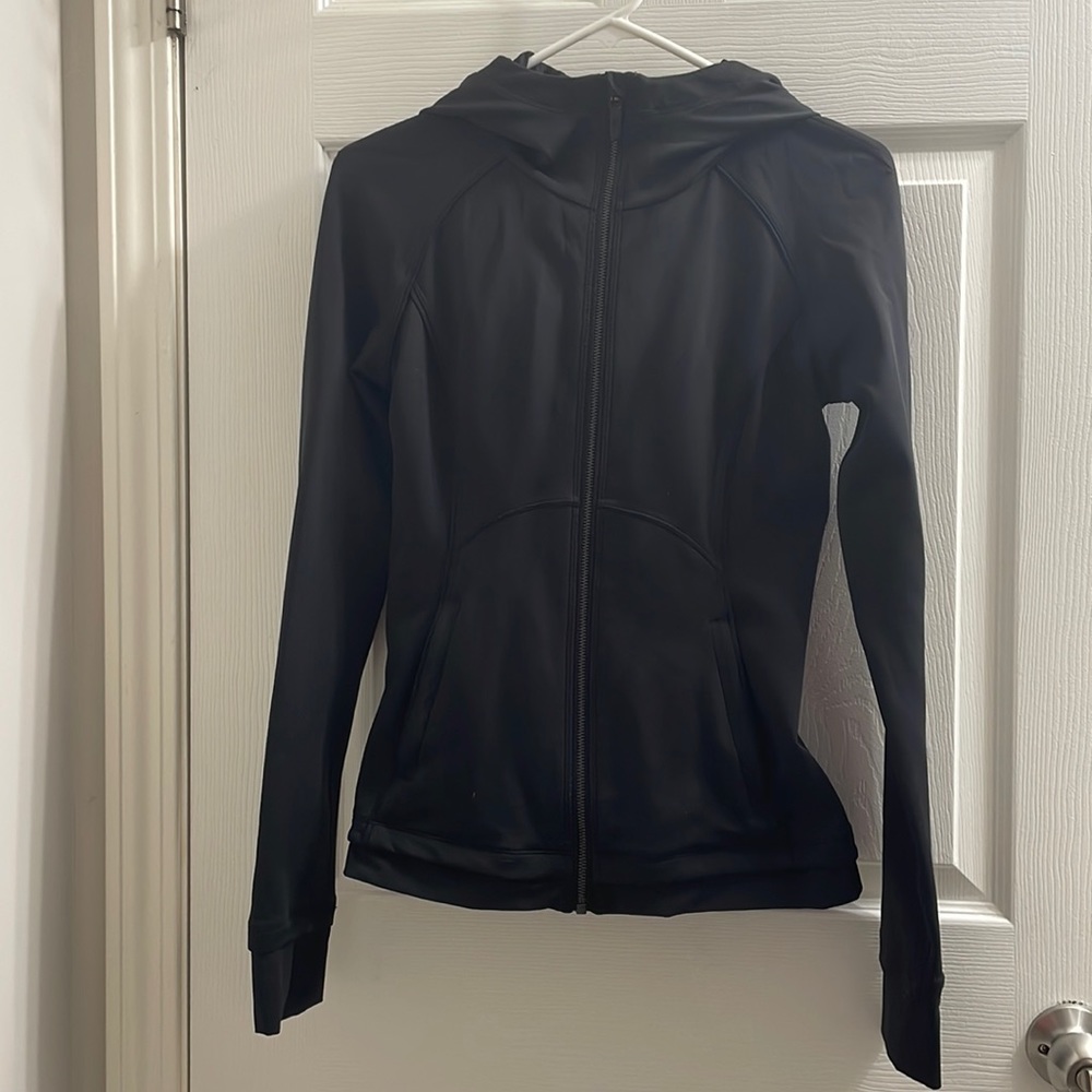 Black Lululemon Jacket with cinched back.